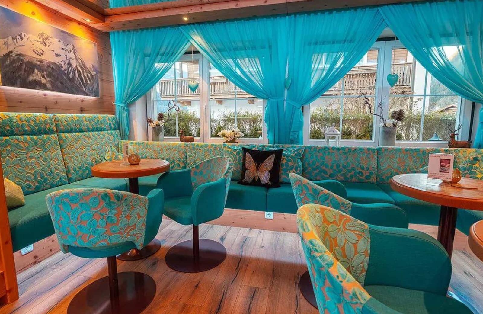 Lounge area with banquette seating and integrated power outlets