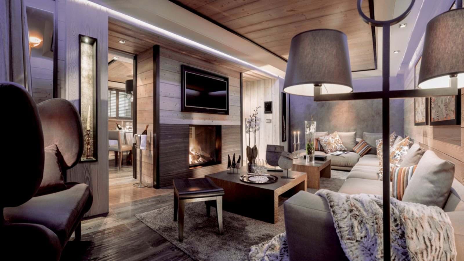 Living area with wood-burning fireplace and sectional seating for 8