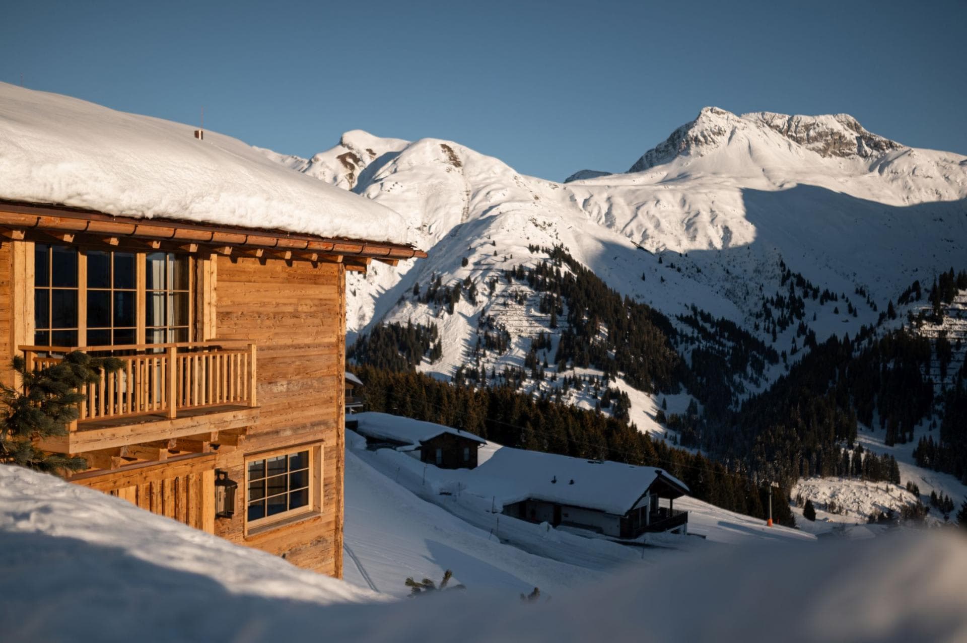 Ski-in/ski-out chalet with private balcony and alpine mountain views