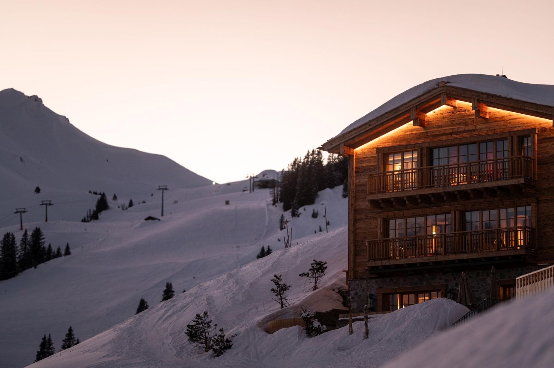 Ski-in, ski-out chalet with private balconies bordering groomed runs