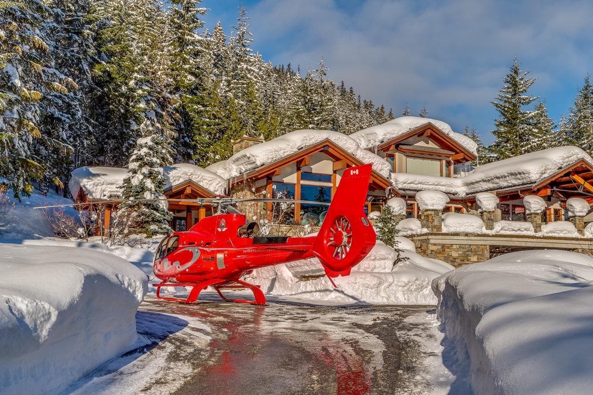 Ski-in chalet with private helicopter pad and heated driveway access