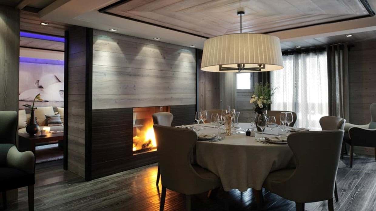 Dining area with dual-sided fireplace and seating for 6