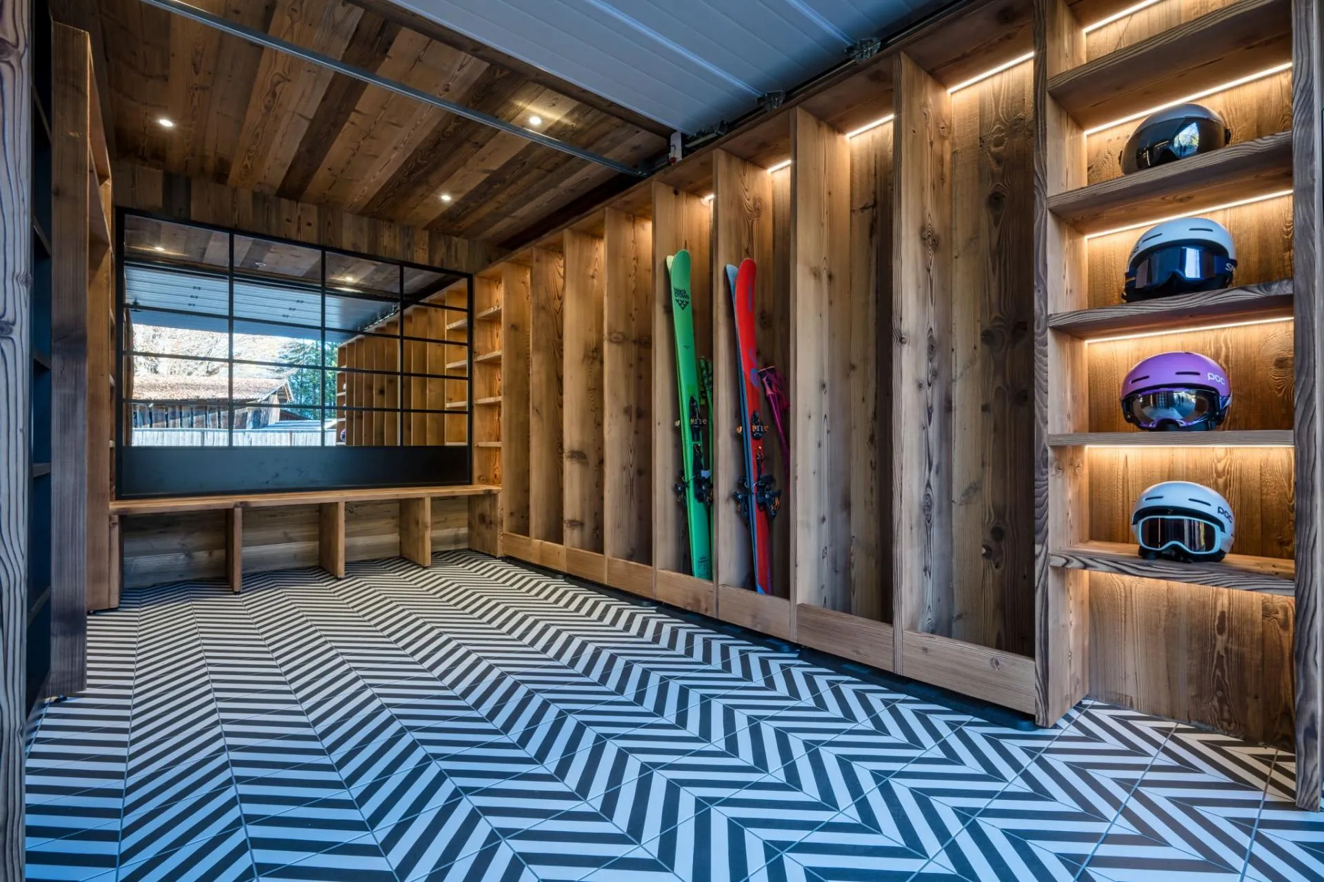 Ski room with gear storage, helmet shelving and bench seating