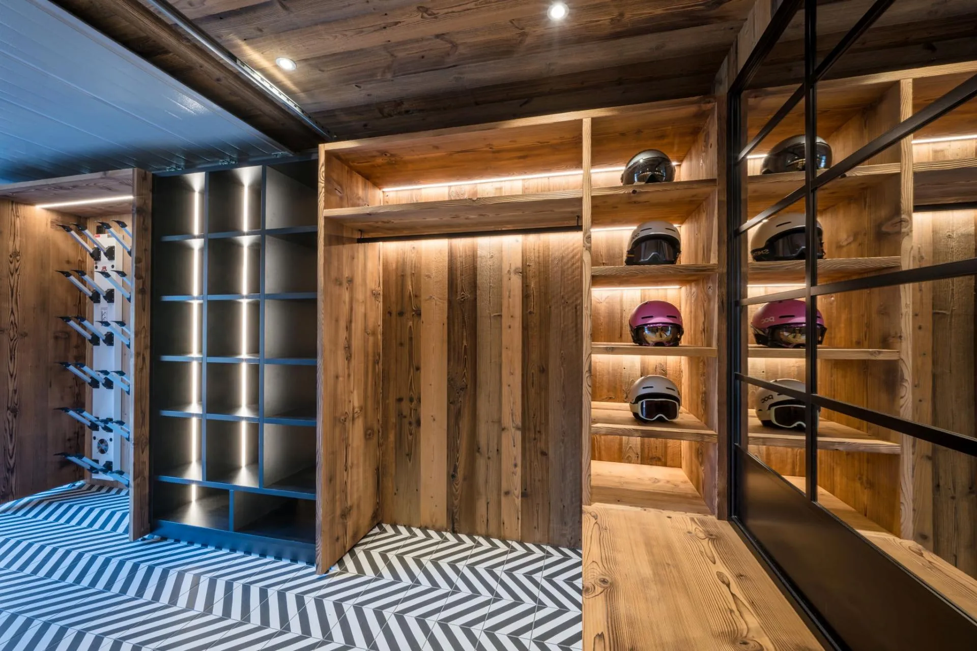 Ski room with heated boot warmers and equipment storage