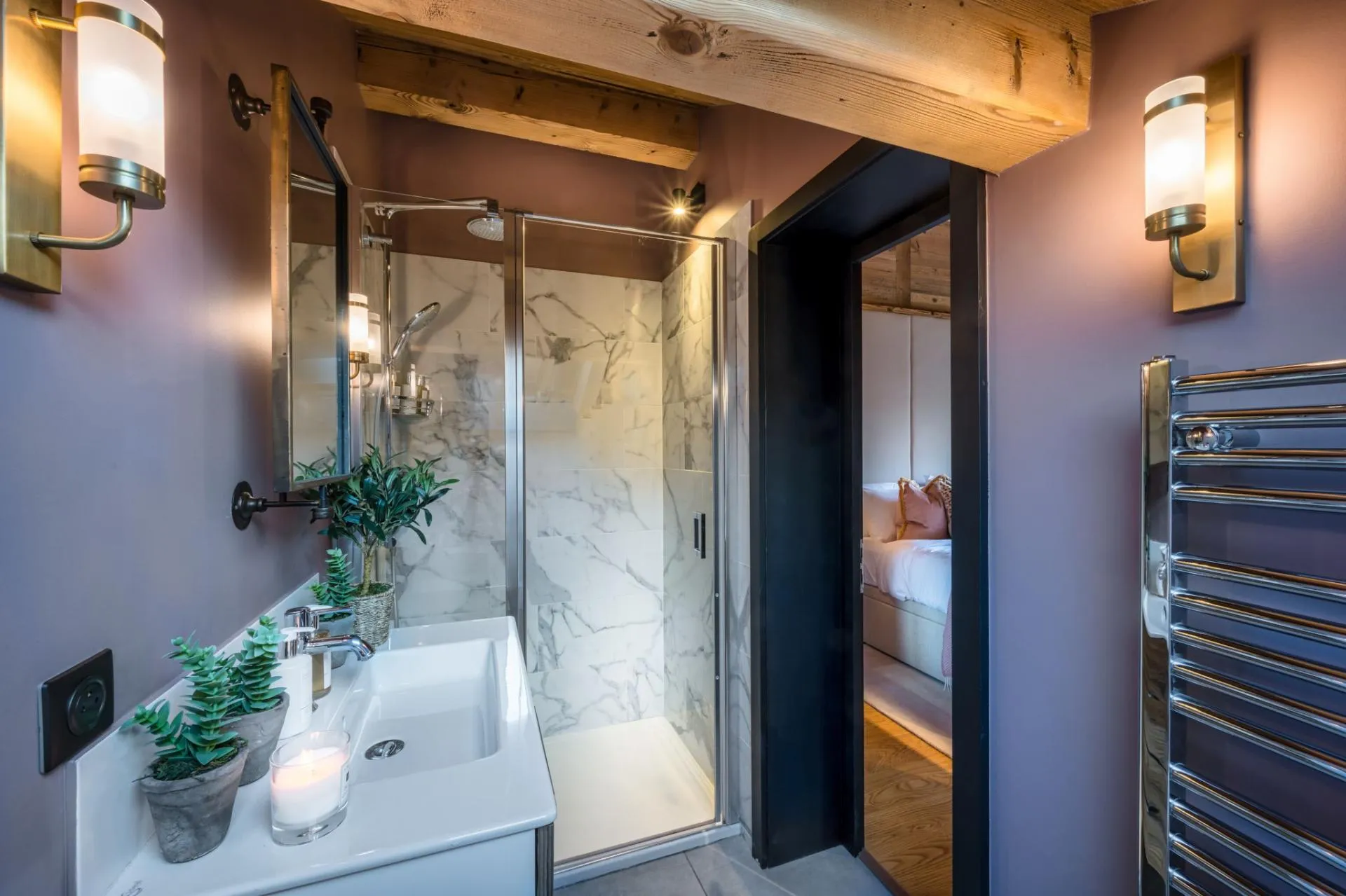 En-suite shower room with a heated towel rail