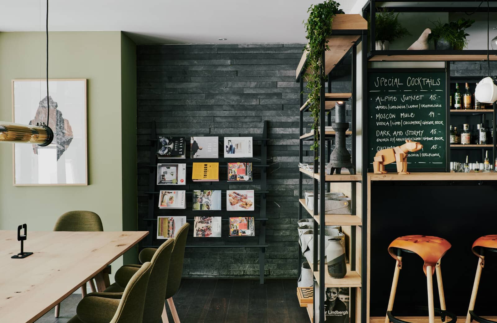 Dining area and bar with chalkboard cocktail menu