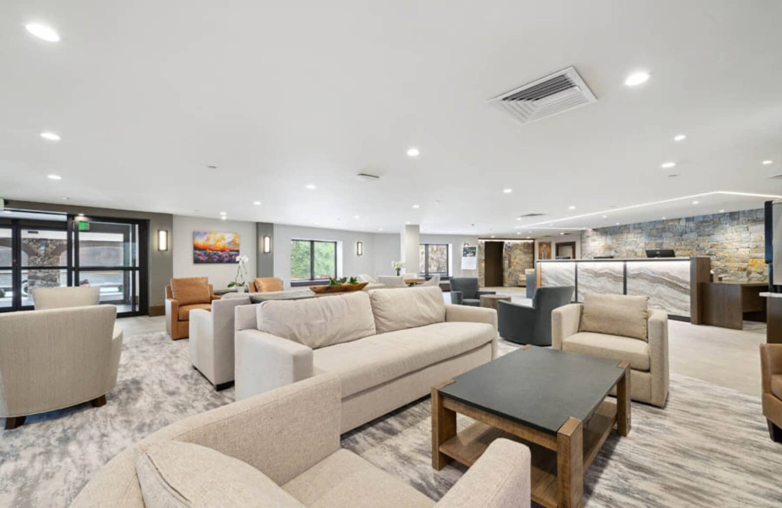 Lobby lounge with seating for 12+ and reception desk