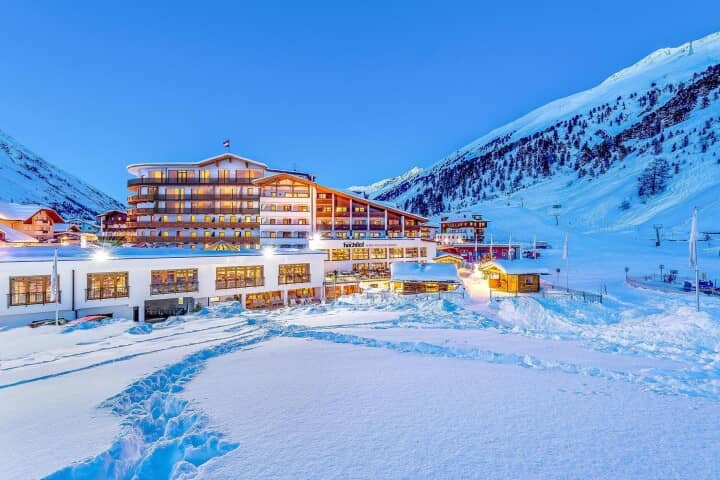 Ski-in/ski-out resort exterior with direct access to mountain trails