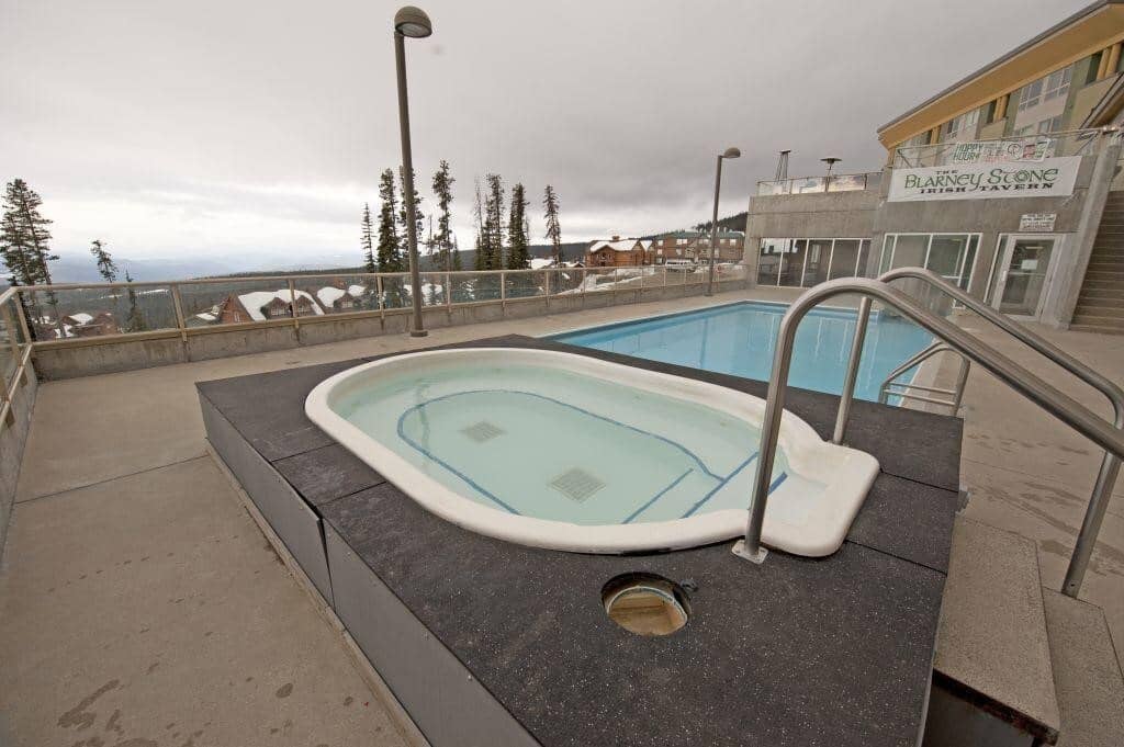 Shared outdoor hot tub and heated pool near Blarney Stone Irish Tavern