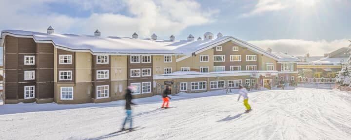 Ski-in, ski-out resort exterior with direct access to groomed trails