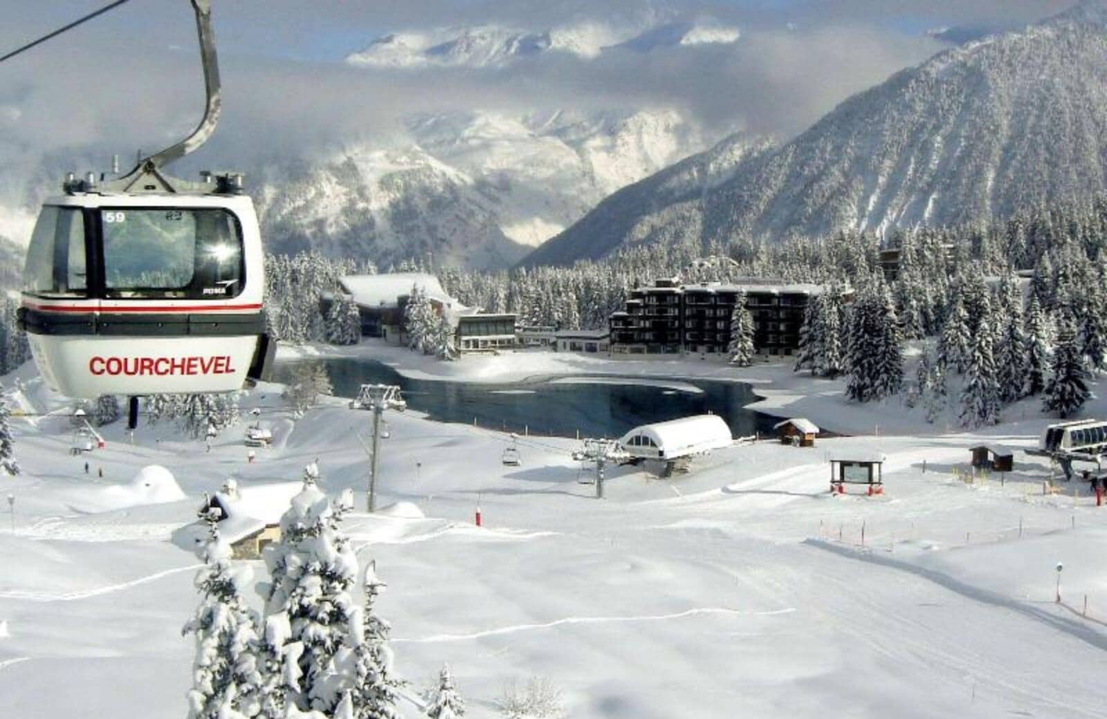 Ski-in/ski-out access via Courchevel gondola with mountain and lake views
