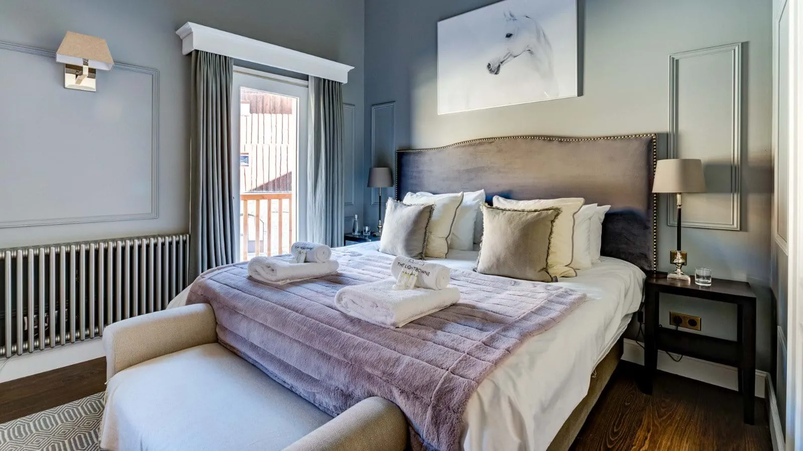 Bedroom with king bed and direct balcony access