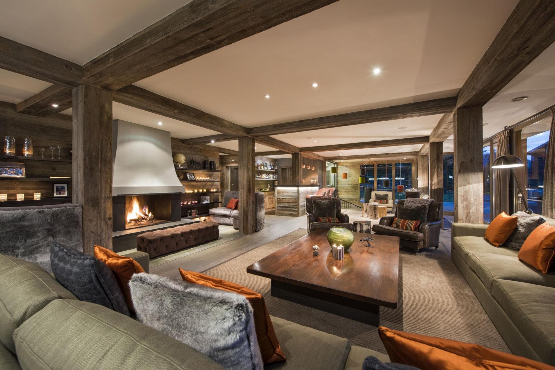 Living area with wood-burning fireplace and walk-in wet bar