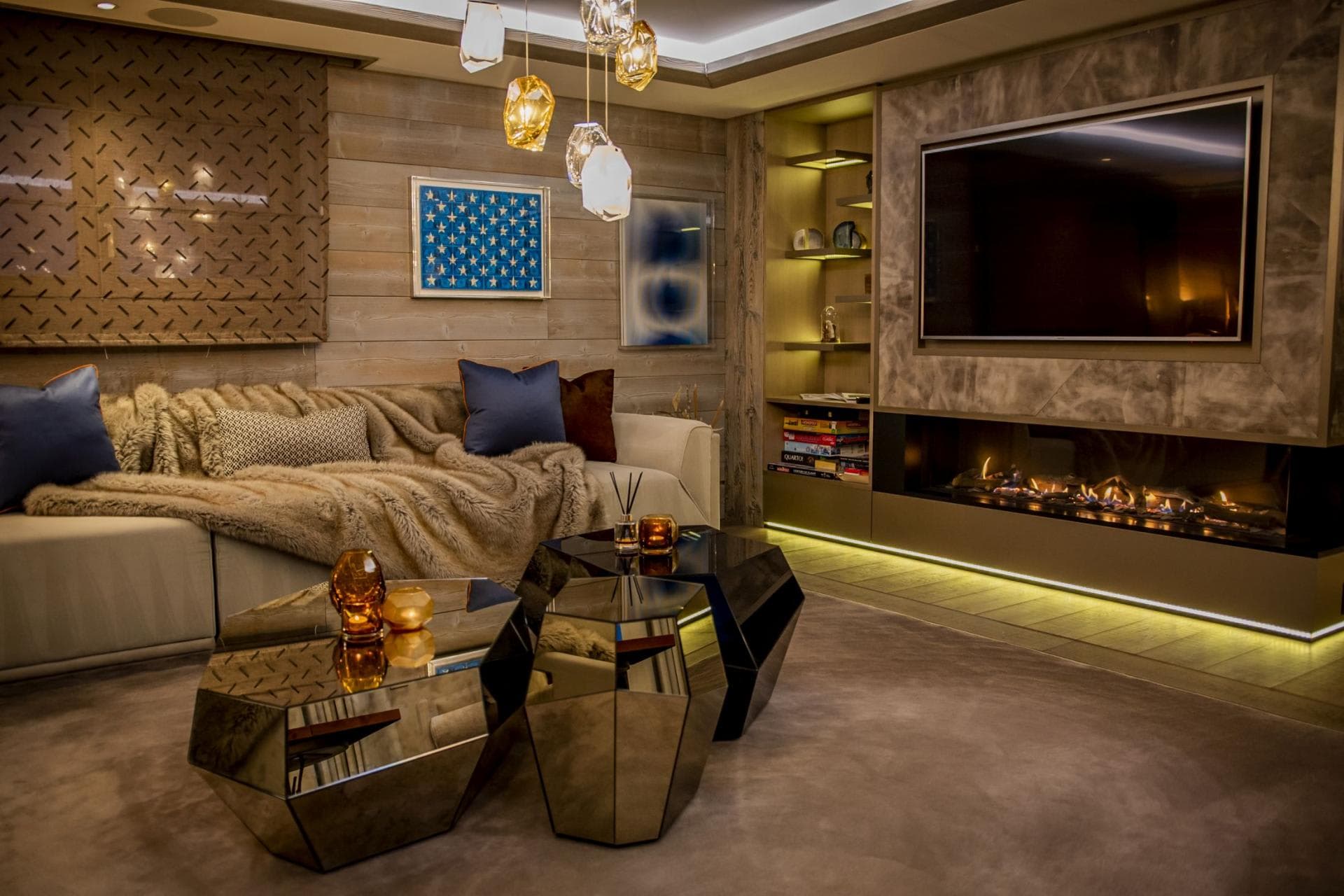 Media room with linear gas fireplace and integrated smart TV