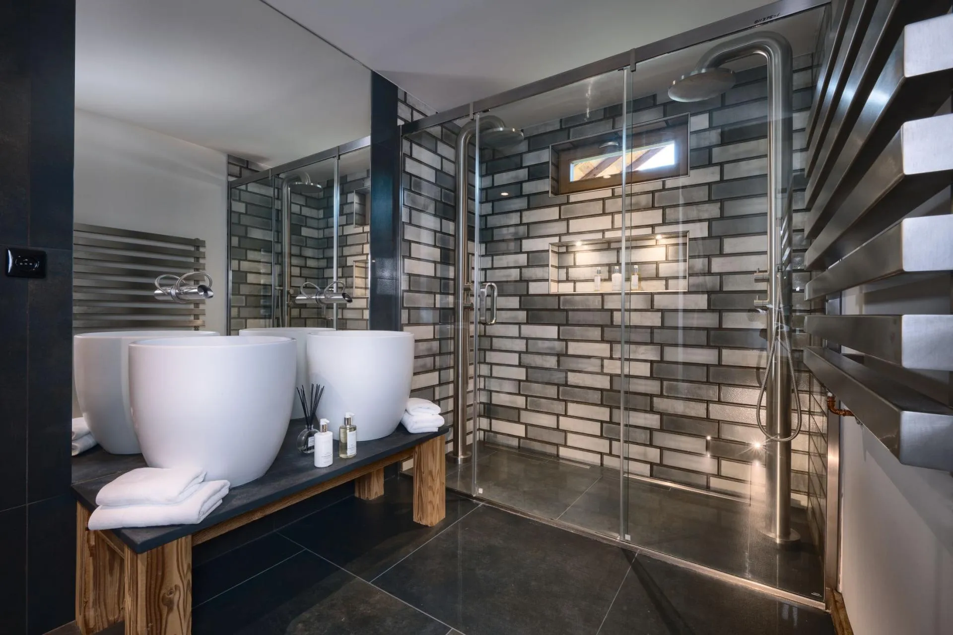 En-suite bathroom with twin basins and a double walk-in shower