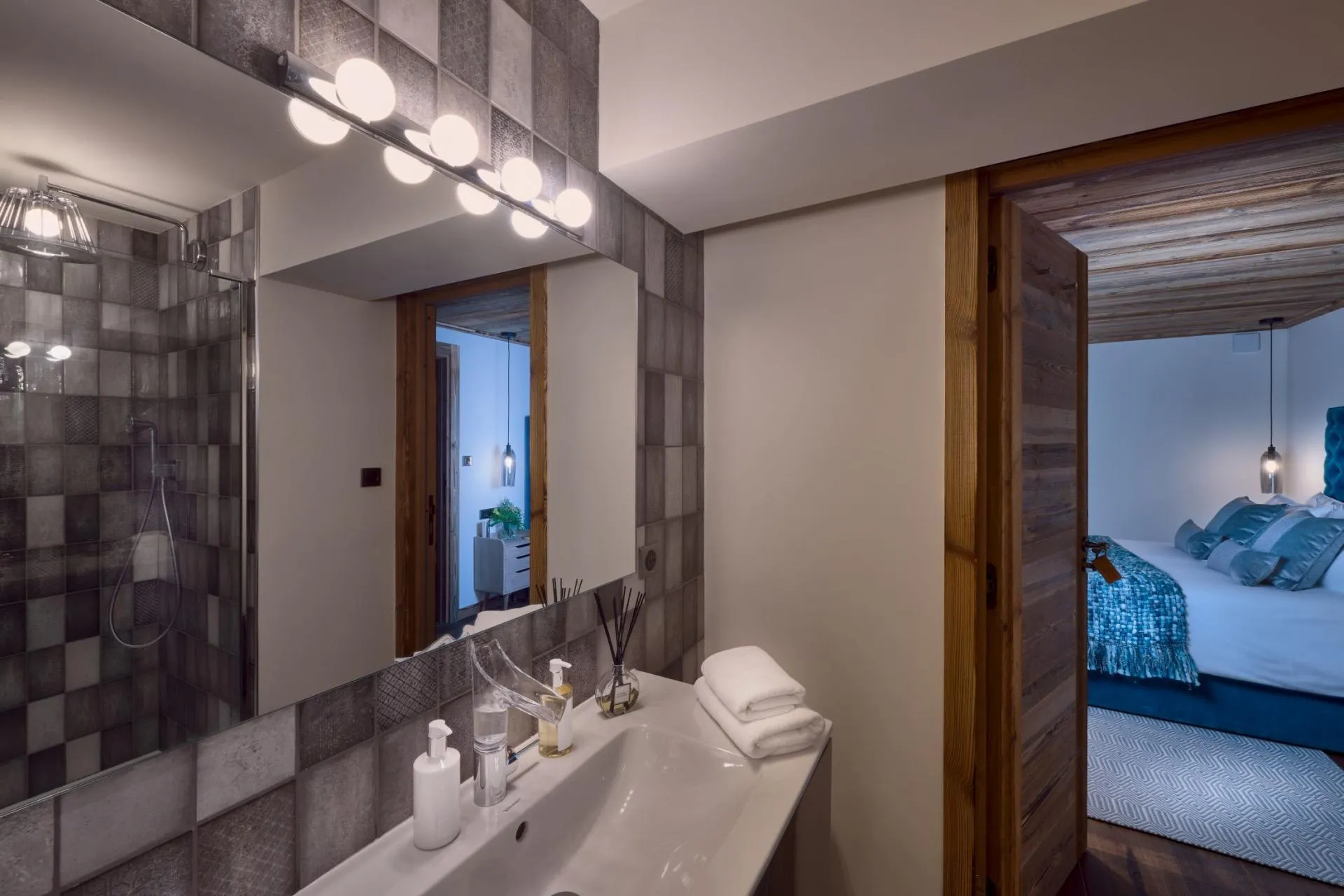 En-suite shower room with a walk-in shower and vanity