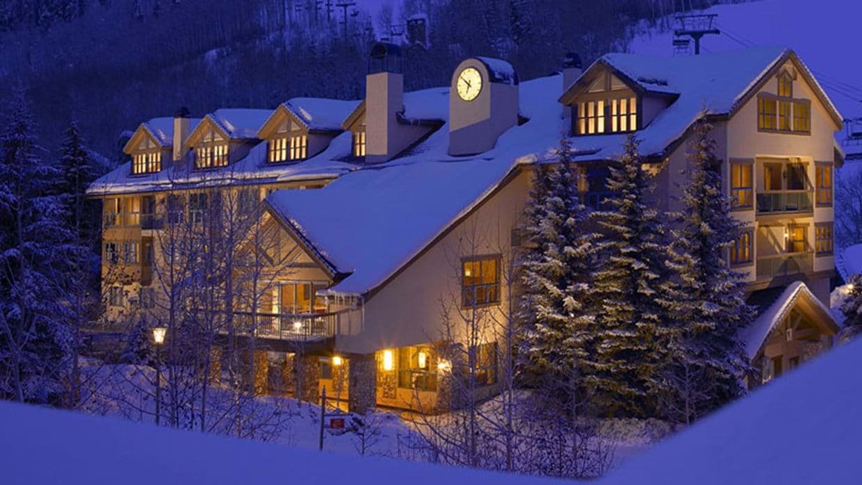 Ski-in/ski-out lodge exterior located directly beside the mountain lift lines