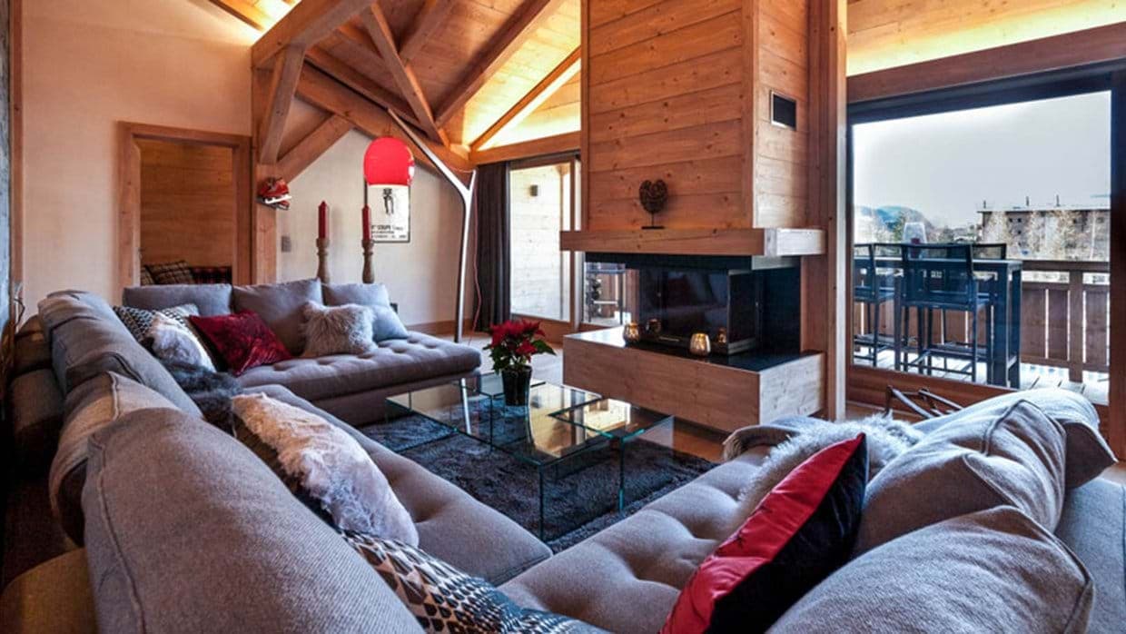 Living room with wood-burning fireplace and sectional seating for 8