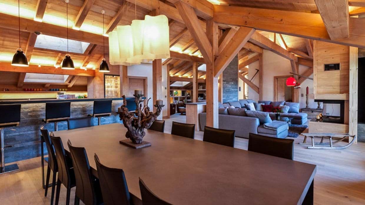 Open living area with dining for 10 and fireplace