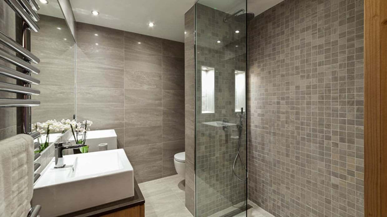 Bathroom with walk-in rainfall shower and heated towel rack