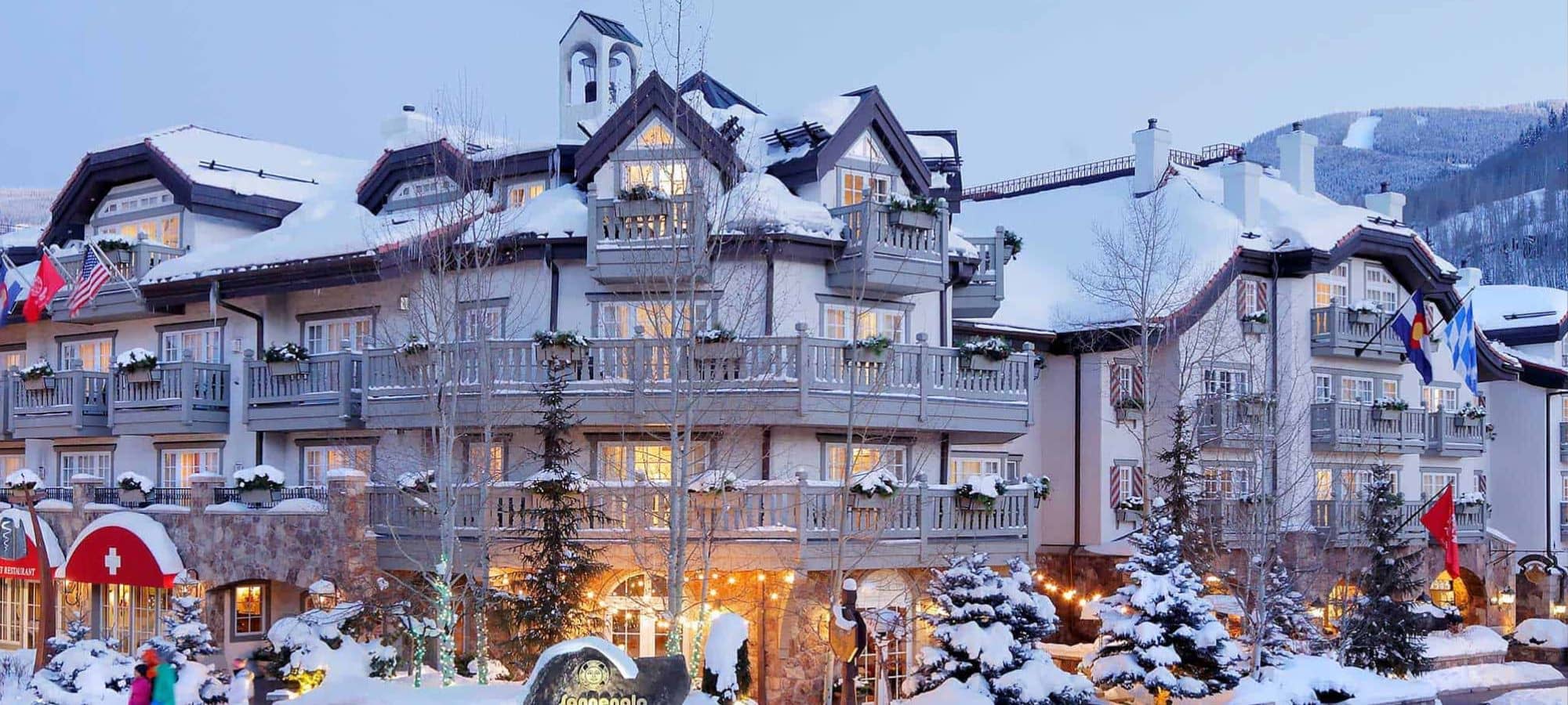 Ski-in/ski-out lodge exterior with balconies and mountain views