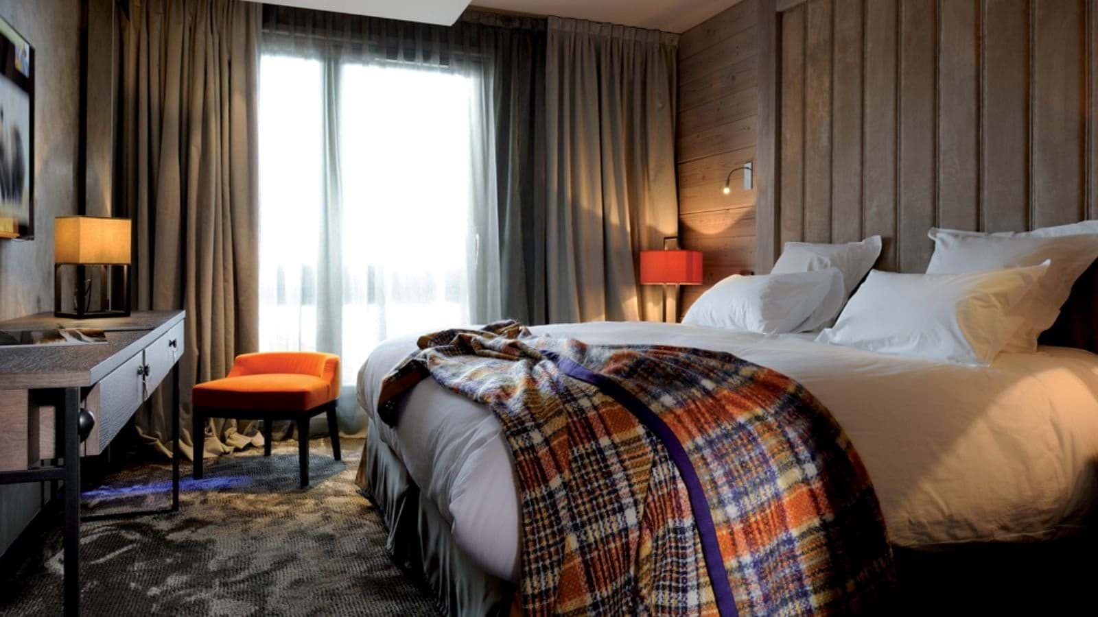 Bedroom with king bed and dedicated desk area