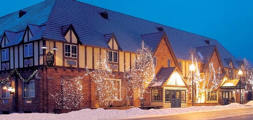 The Wort Hotel exterior with holiday lights and street-level bar access