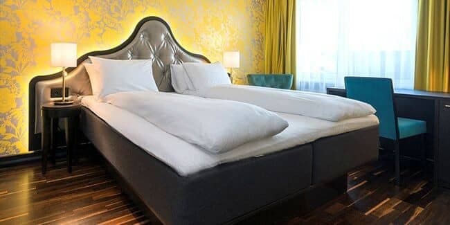 Guest bedroom with king bed and dedicated workspace