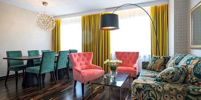 Open living and dining area with seating for 6 at the table