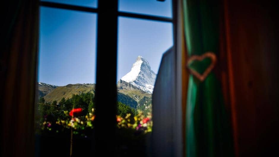 Bedroom window view of the Matterhorn peak and alpine valley