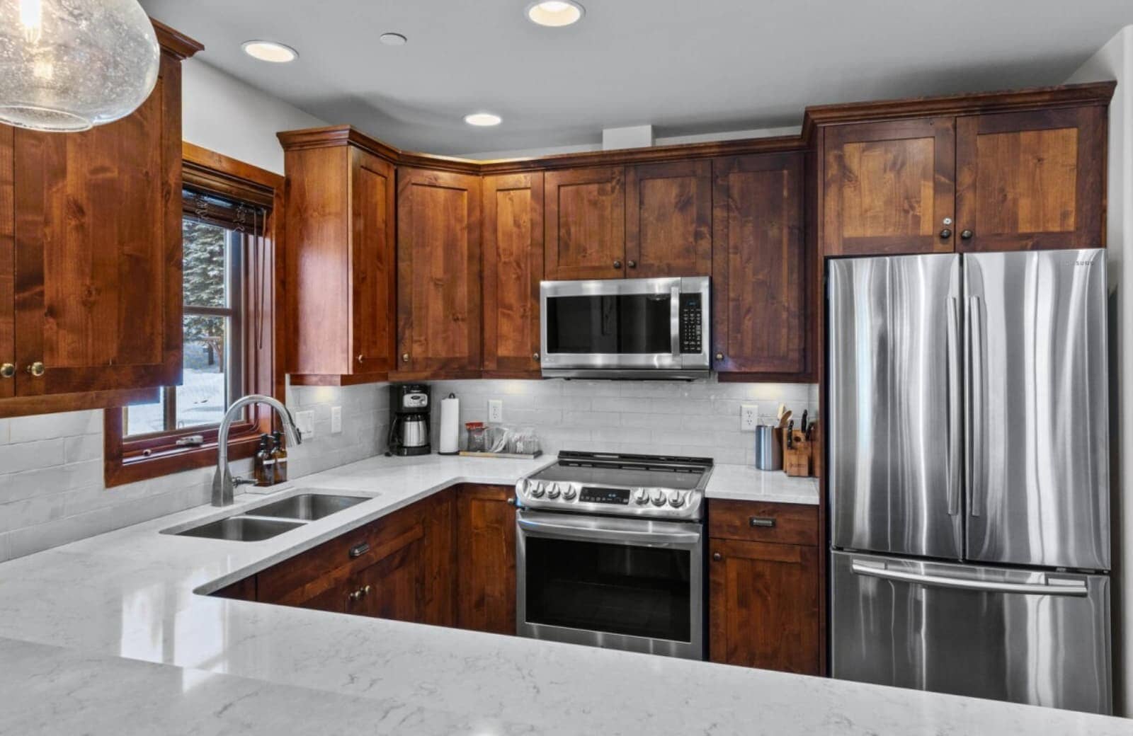 Kitchen with stainless steel appliances and French door refrigerator