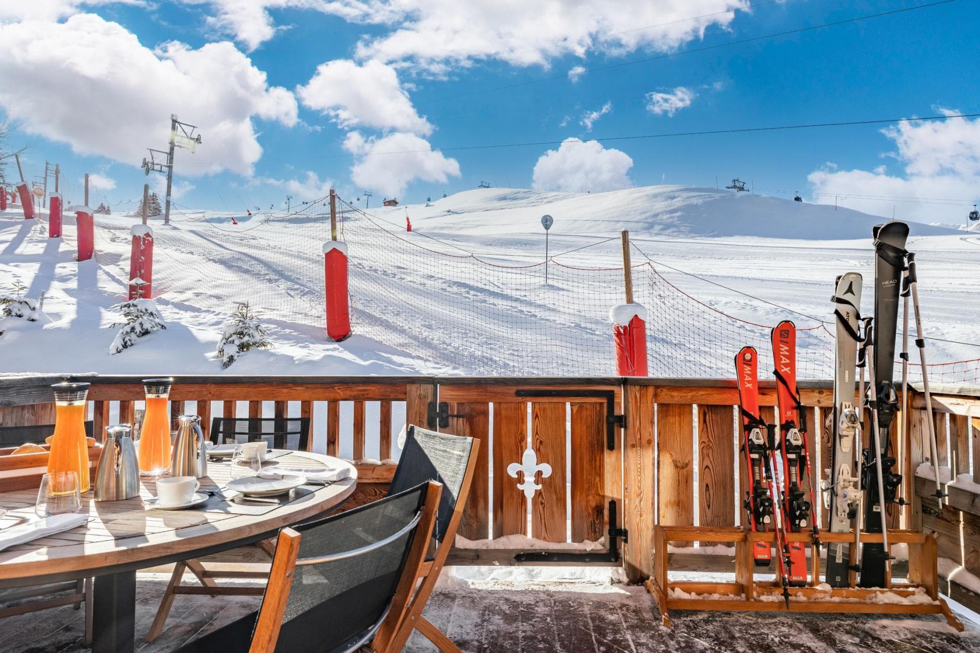 Ski-in/ski-out terrace with mountain views and outdoor ski rack