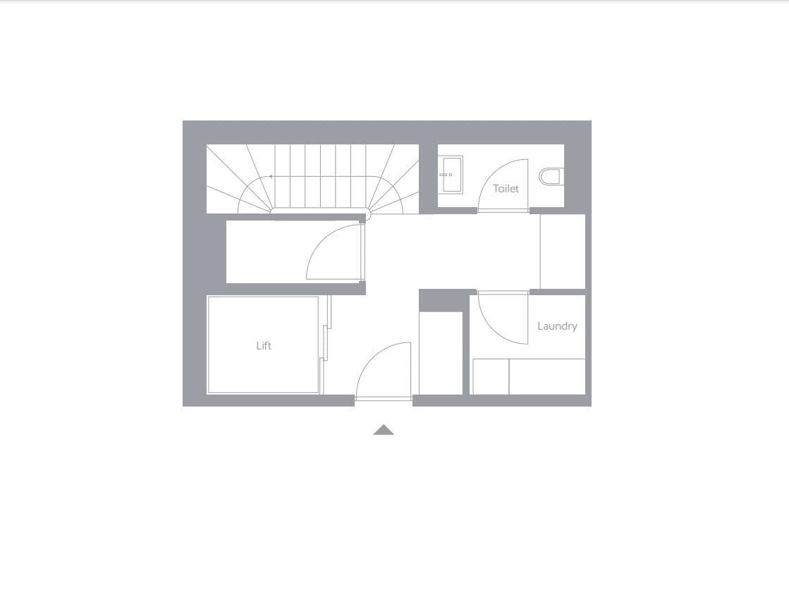 Ground floor plan: lift access, laundry room, toilet, and stairs