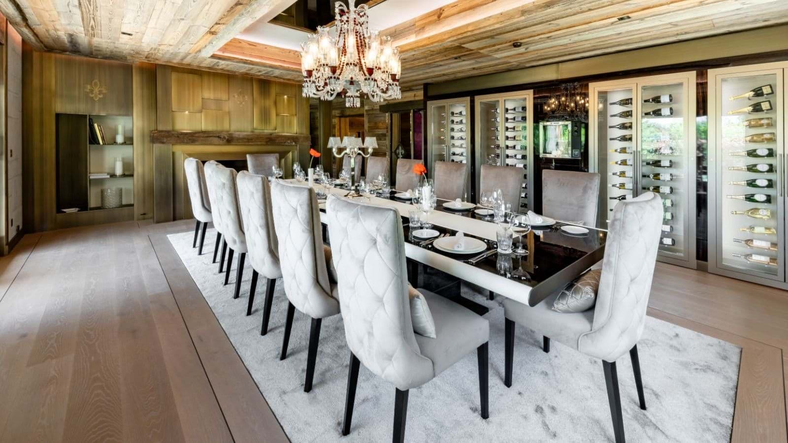 Dining room seats 14 with floor-to-ceiling wine refrigerators