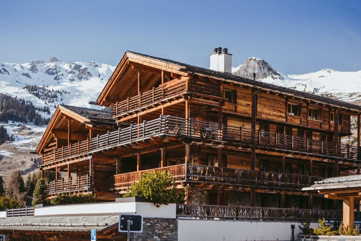 Timber-framed chalet with private balconies and snow-capped mountain views