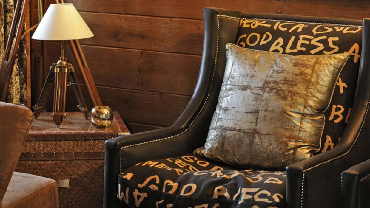 Reading nook with high-back armchair and tripod floor lamp