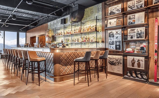 Bar with seating for 12; mountain views