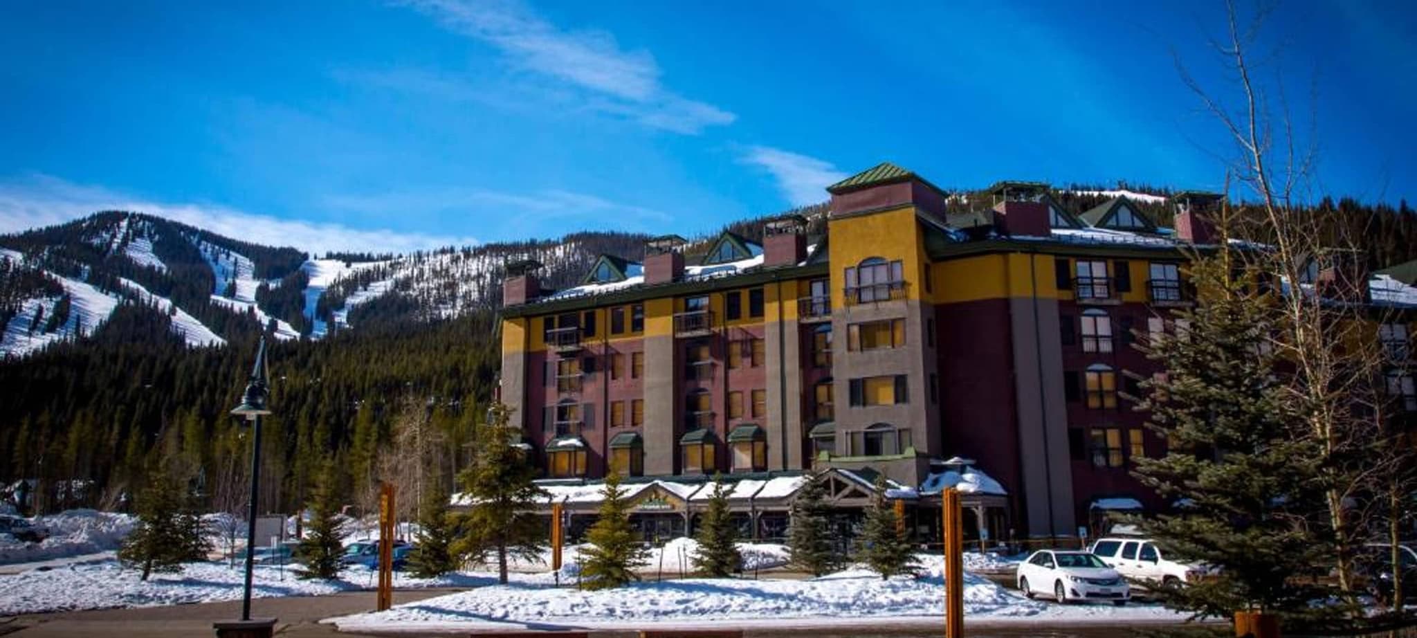 Ski-in/ski-out lodge exterior with direct access to mountain trails