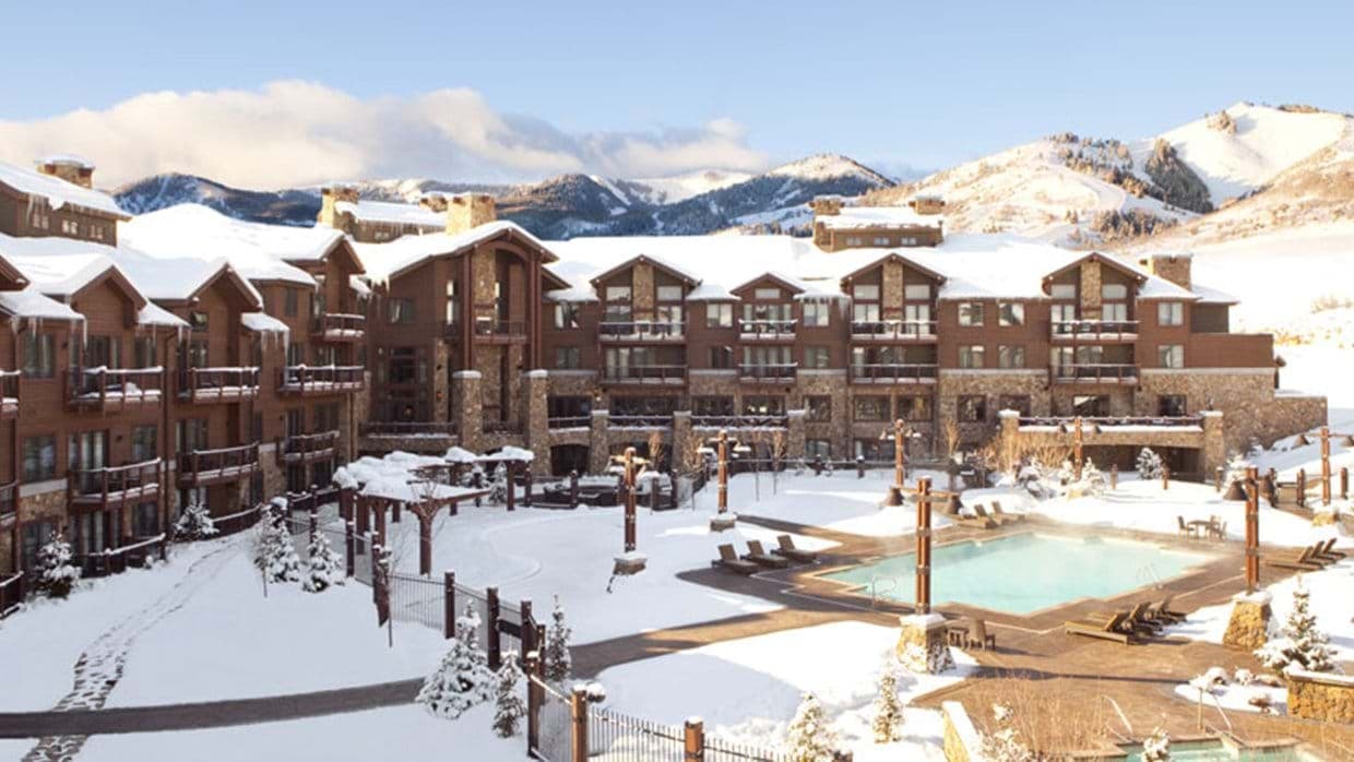 Ski-in/ski-out resort exterior with heated year-round pool and mountain views