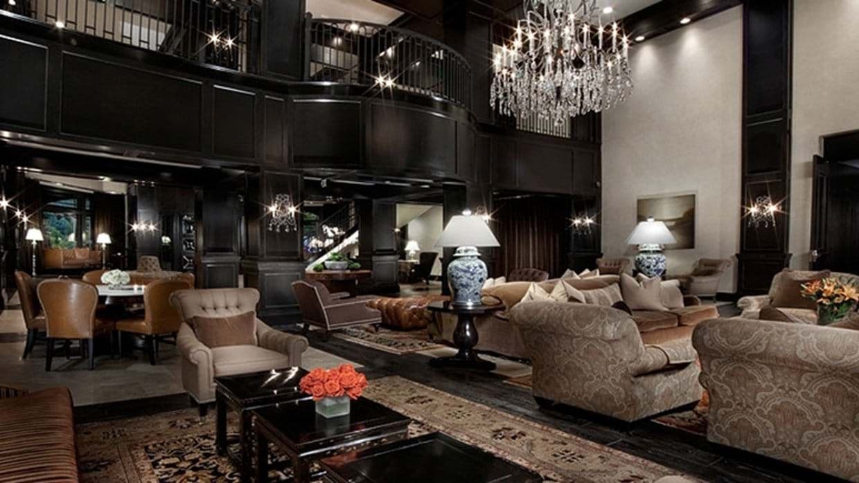 Great room with double-height ceilings and overlooking mezzanine gallery