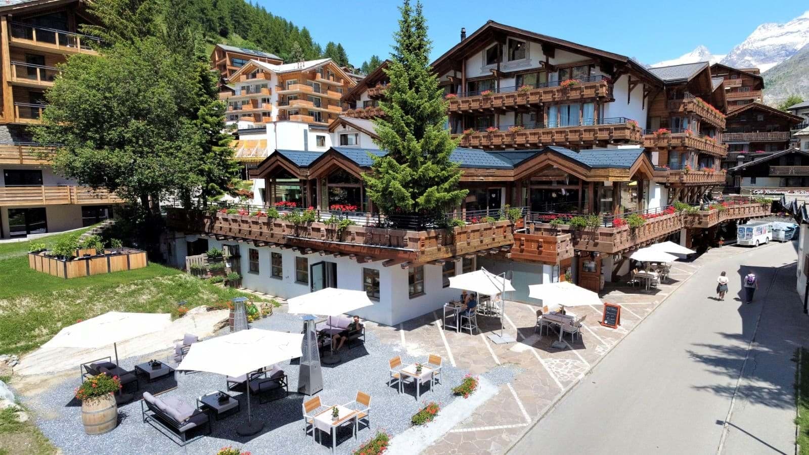 Multi-level terrace with lounge seating and Matterhorn views