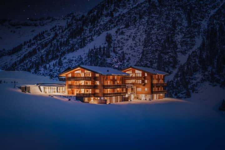 Ski-in/ski-out mountain chalets with private balconies and floor-to-ceiling windows