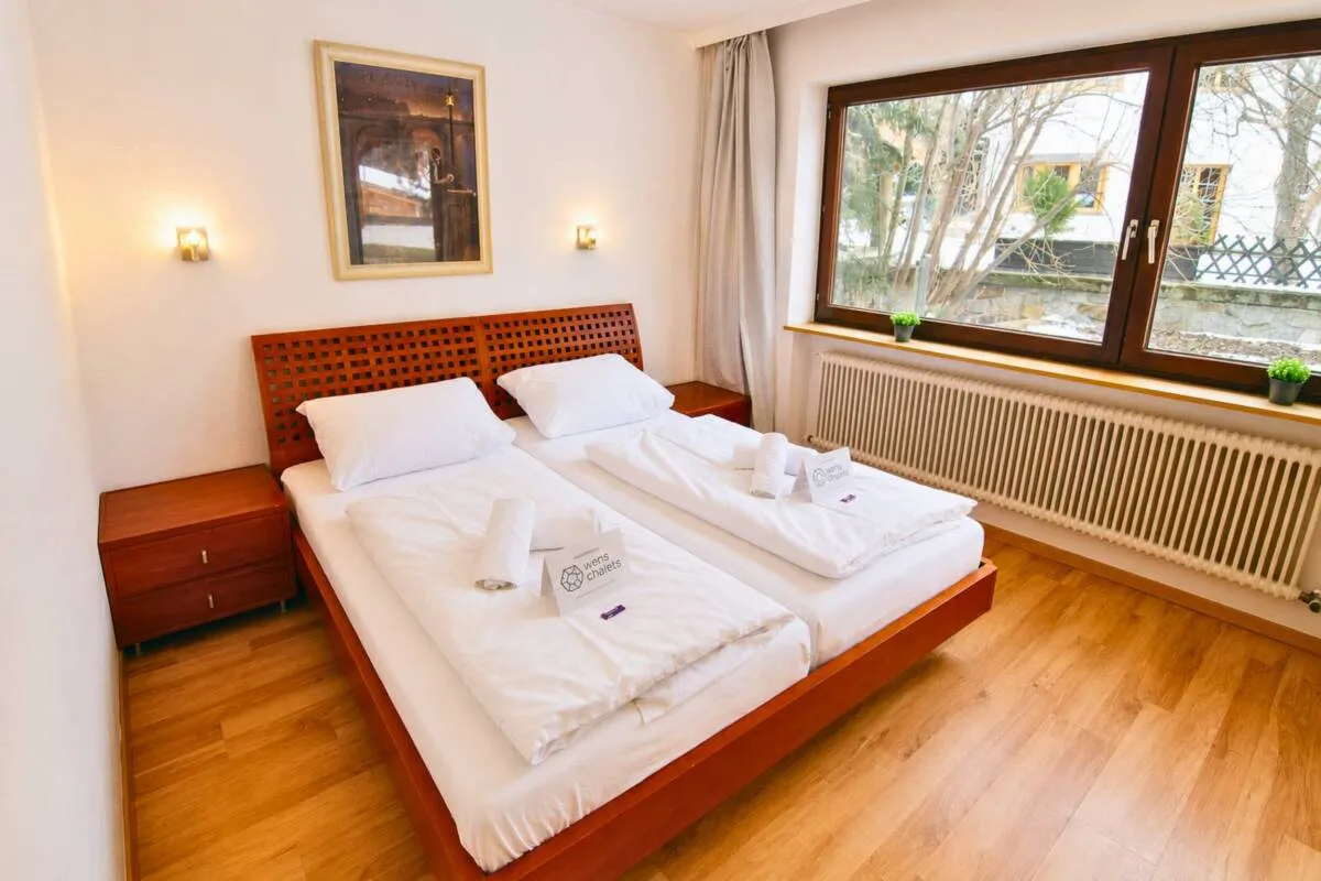 Guest bedroom beside a window