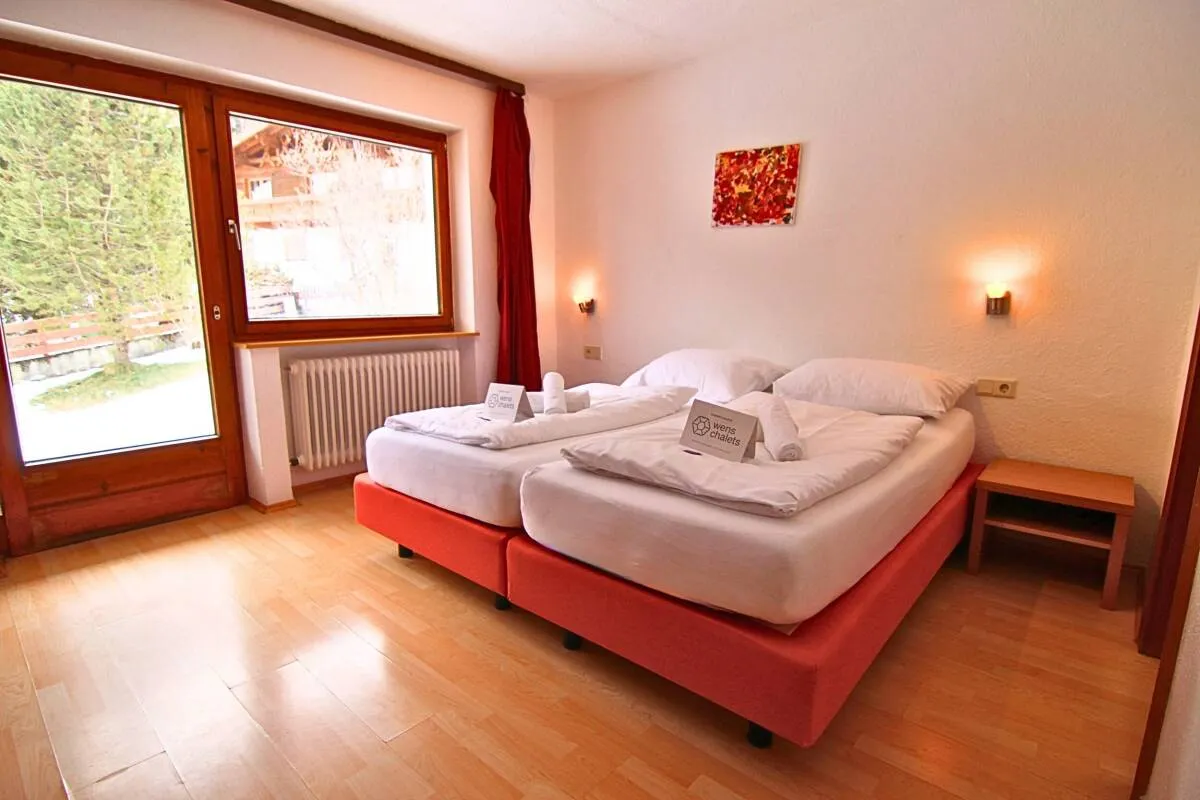 Guest bedroom with bedside lighting