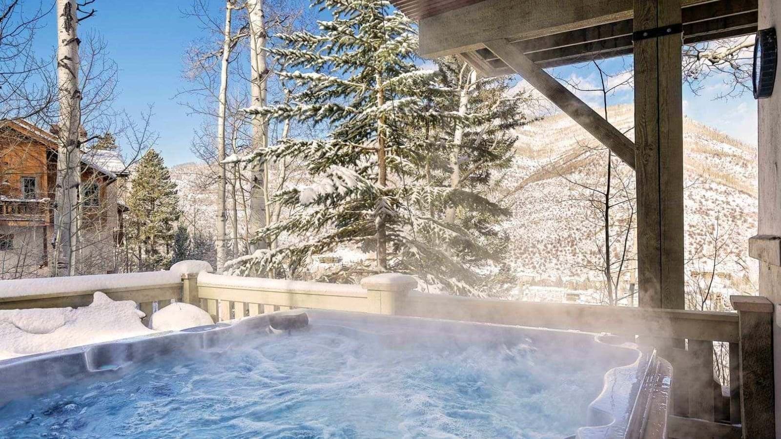 Private outdoor hot tub with mountain and valley views