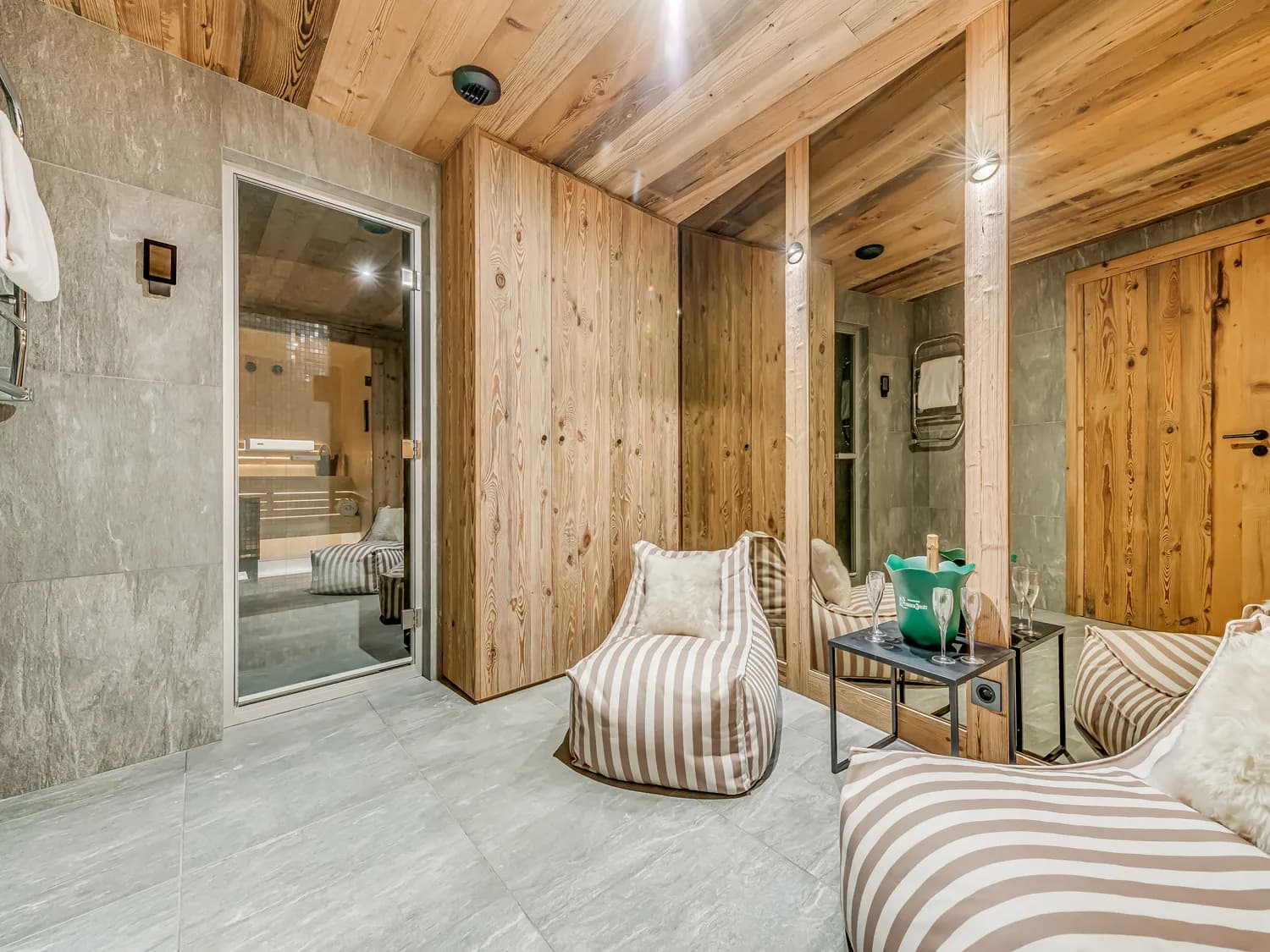 Private spa lounge beside sauna and hammam doors