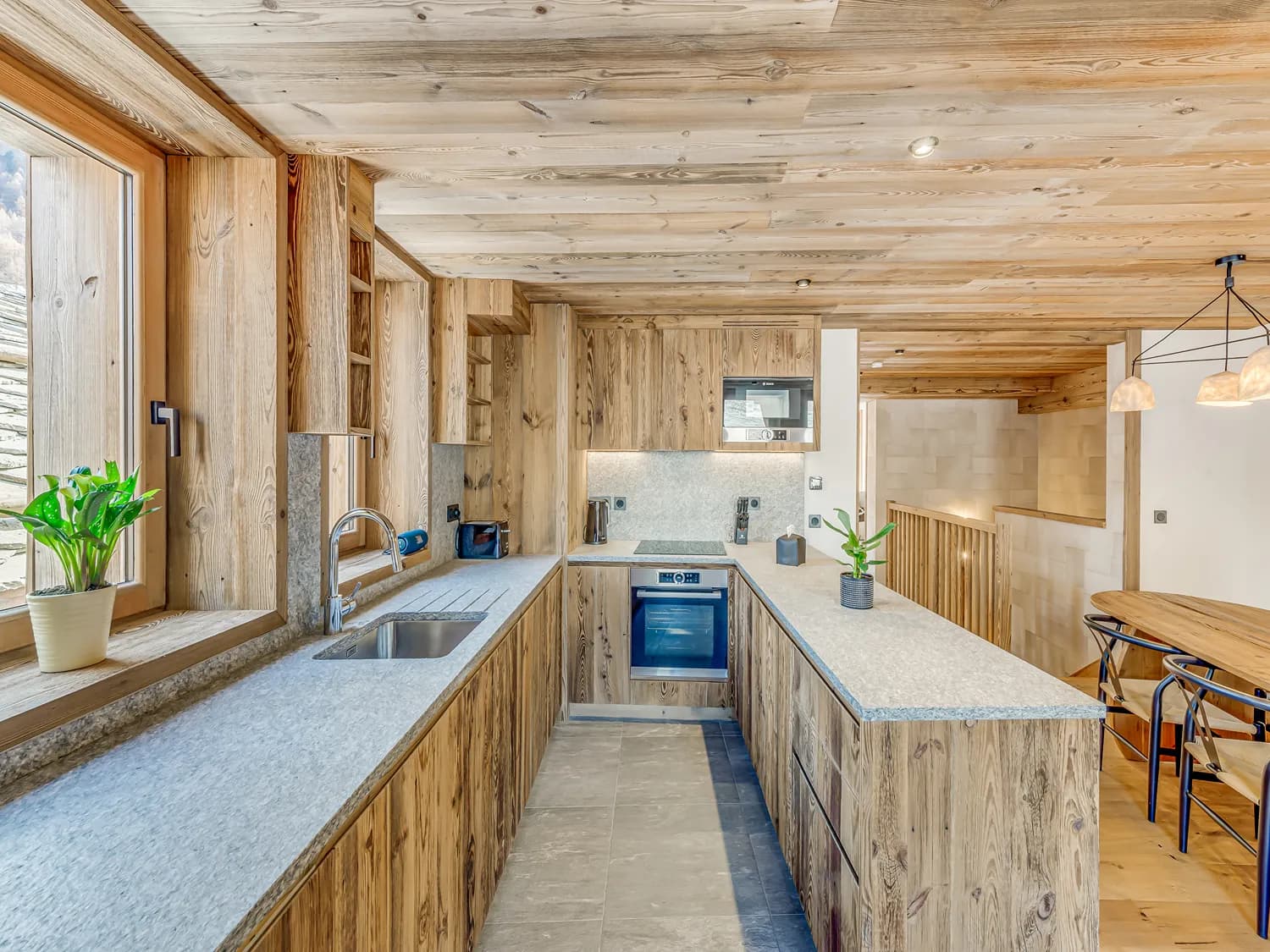 Equipped kitchen with timber cabinetry