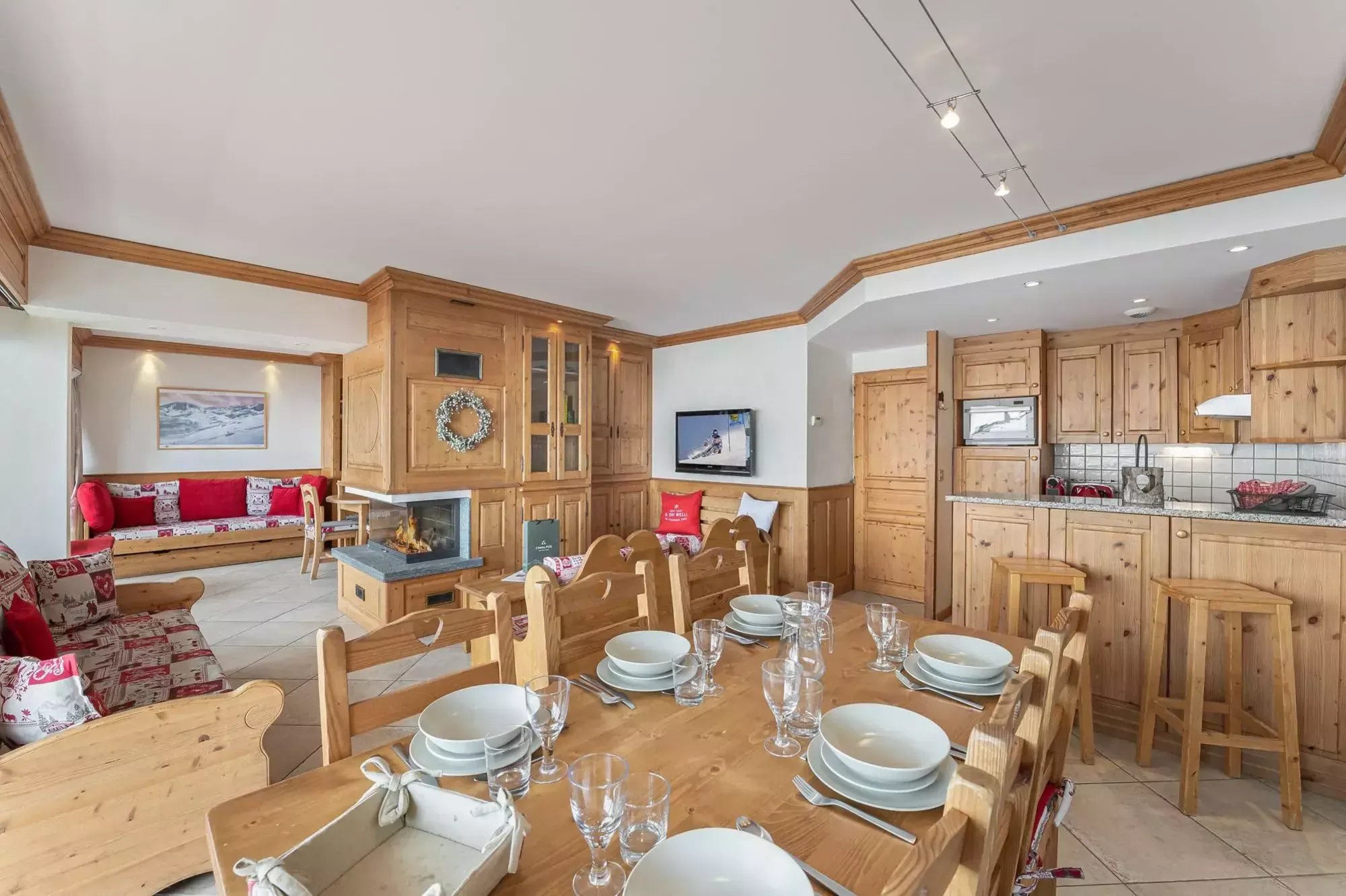 Open living and dining area with fireplace