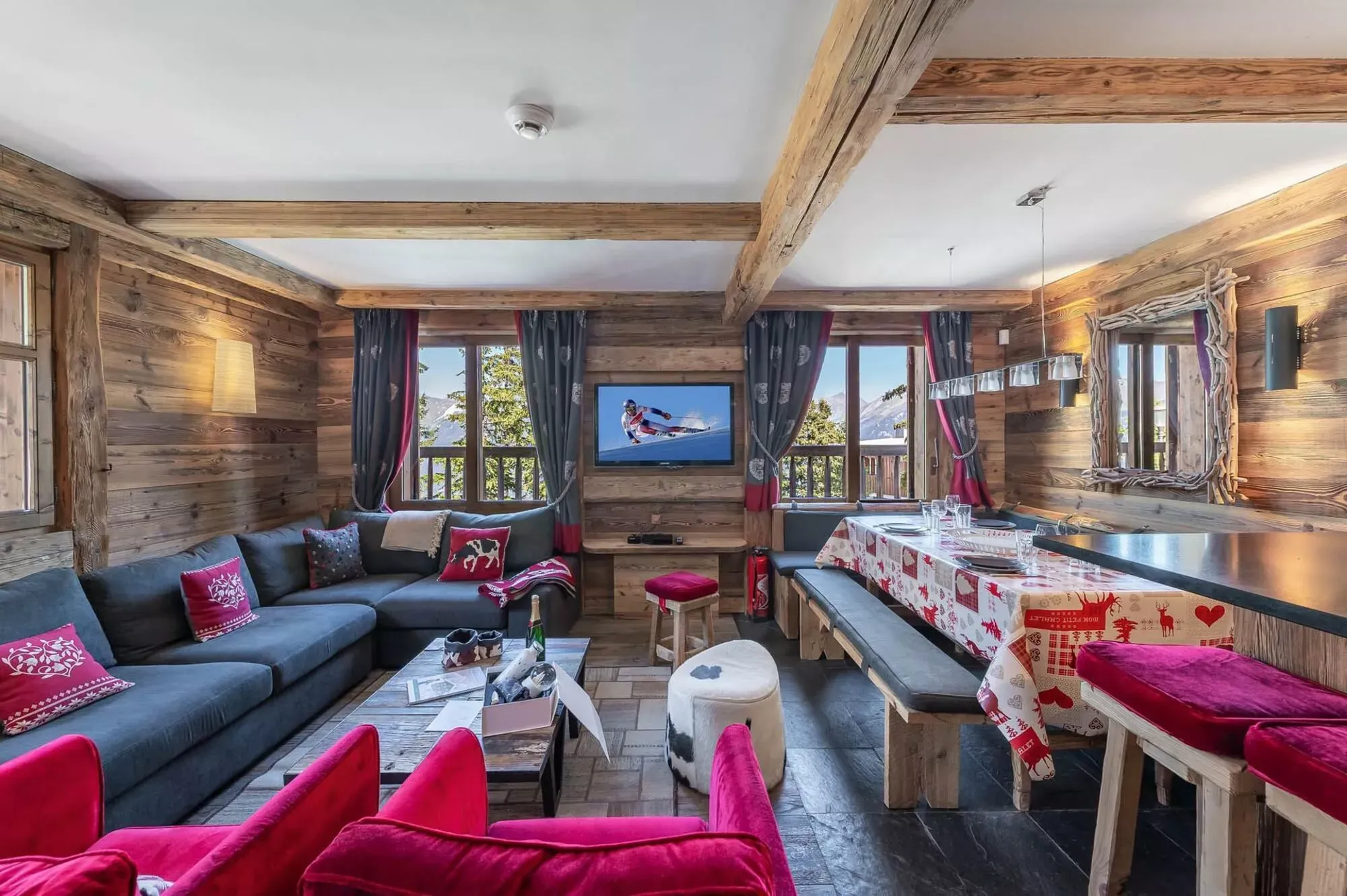 Open-plan living and dining area with mountain views