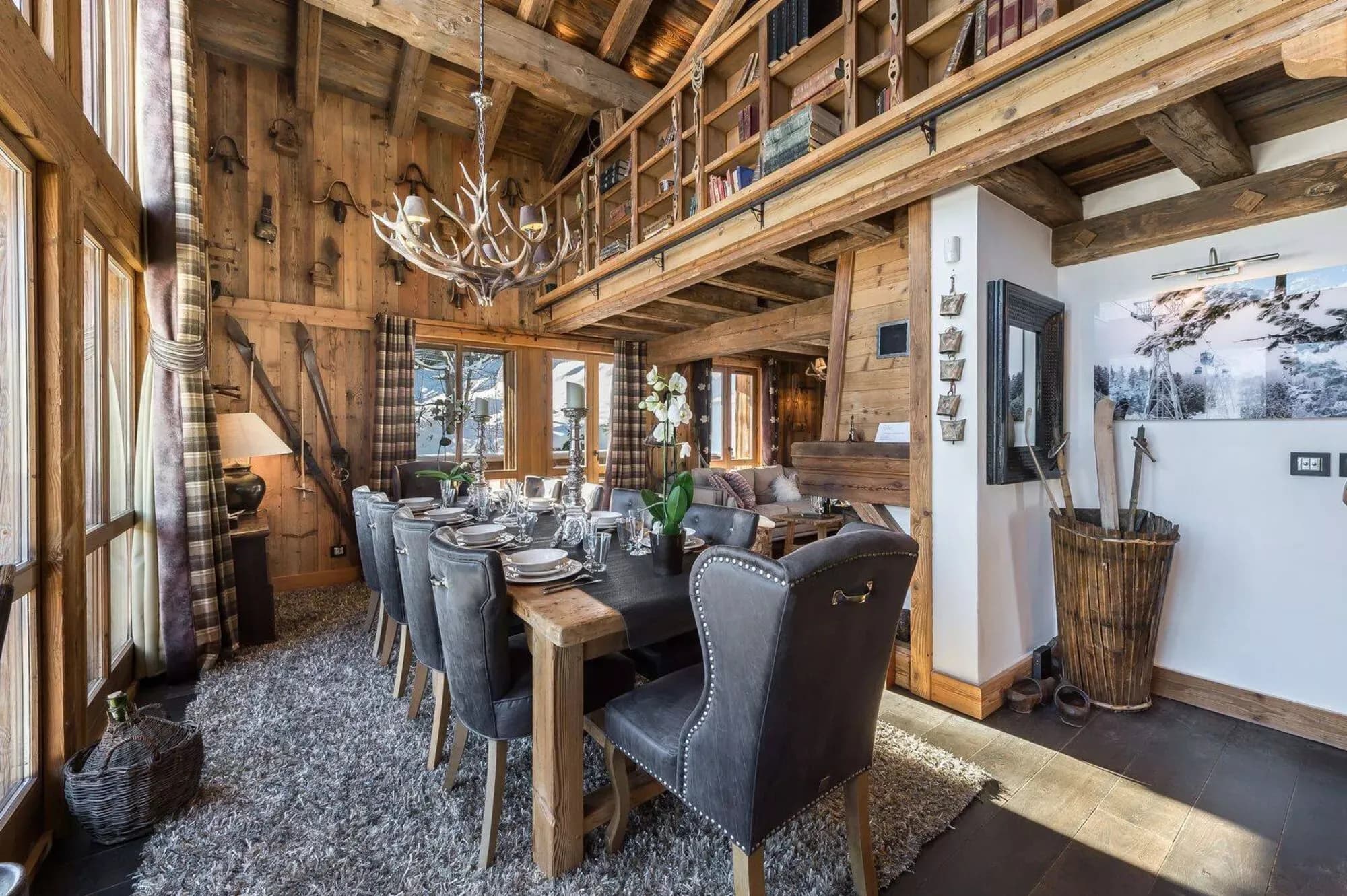 Dining room beneath a high timber ceiling